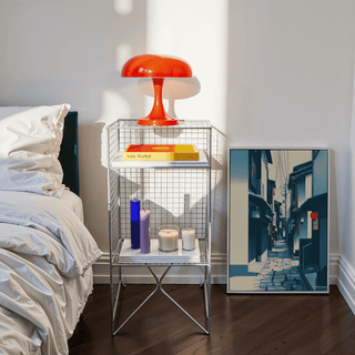 Room scene with Japanese Street Wall Art poster displayed above a simple console