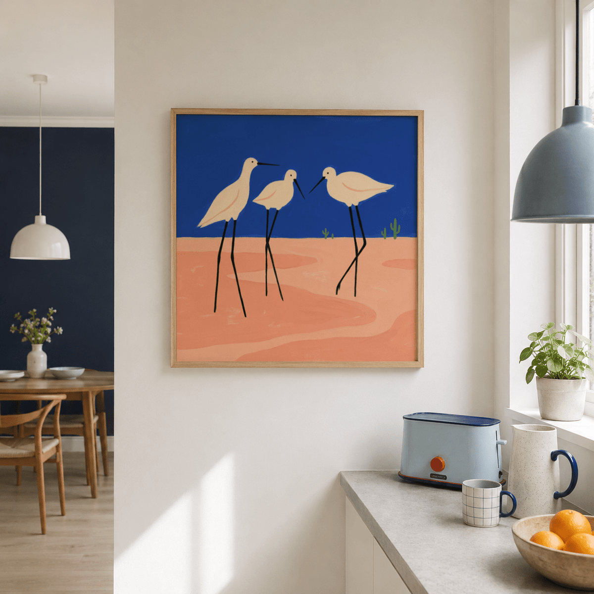 Framed mockup showing Birds Minimalist Wall Art with three birds on a desert-like ground