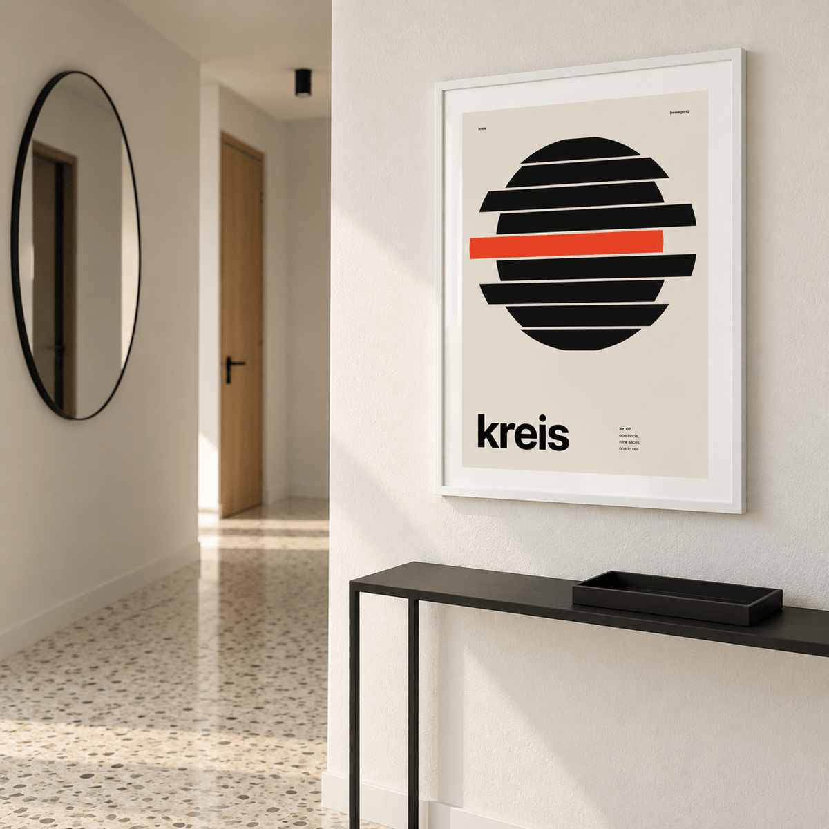 Sliced circle with one red band print above a console table in a hallway
