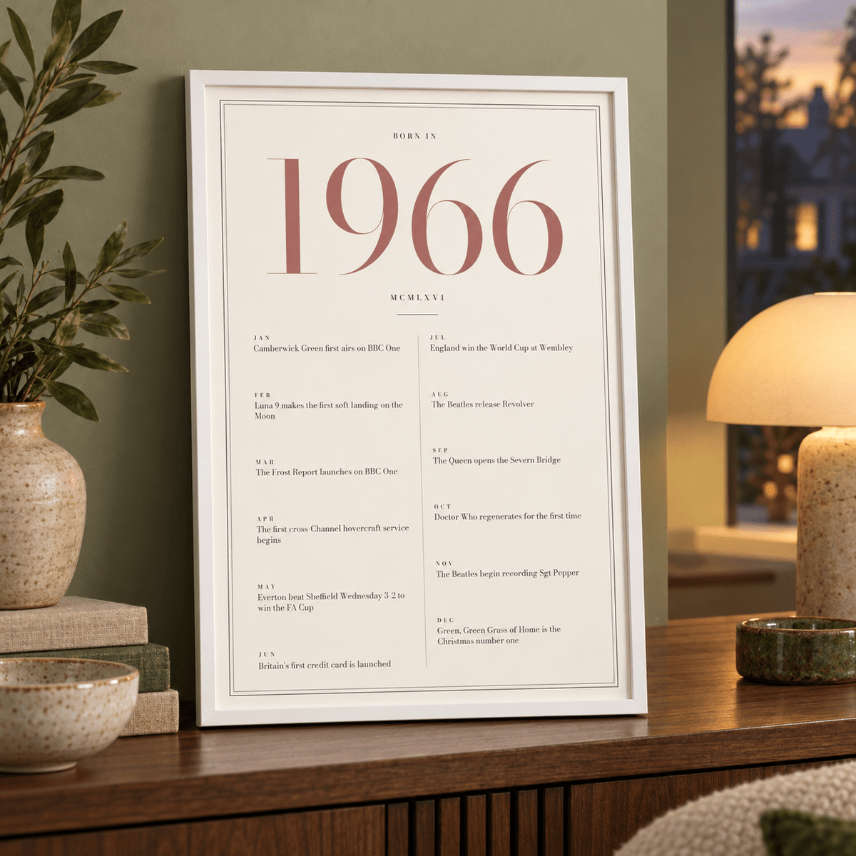 Cream and dusty rose 1966 birth year print in a calm room setting