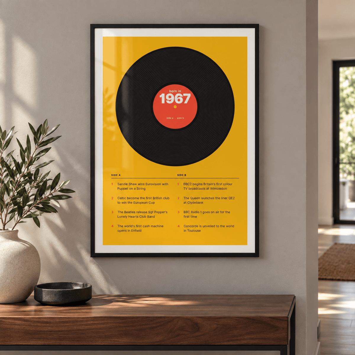Black vinyl record print with a 1967 label in a calm room setting