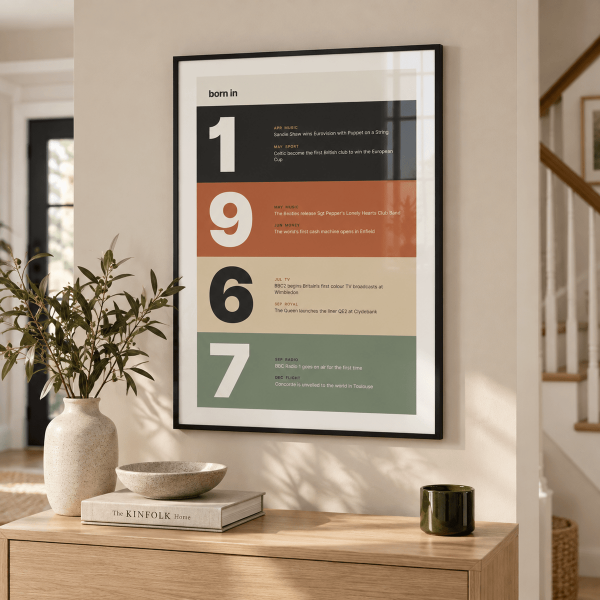Charcoal terracotta sand and sage 1967 print in a calm room setting