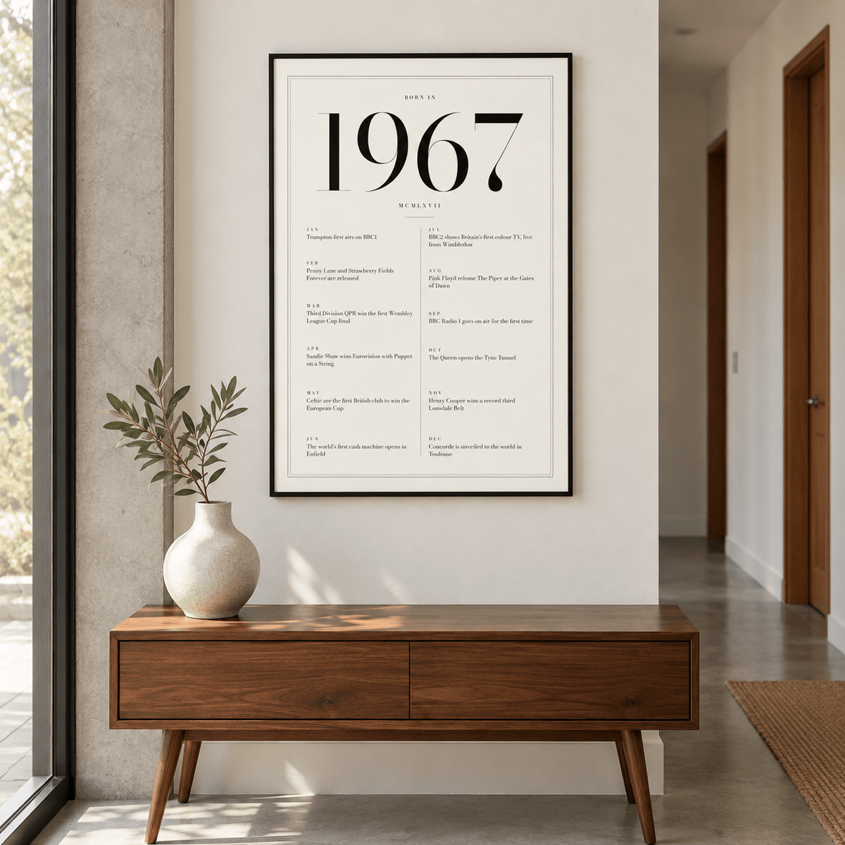 White and black 1967 birth year print in a calm room setting