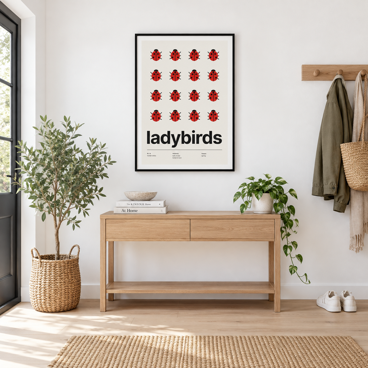 Sixteen red ladybirds in a grid above a console table in a hallway