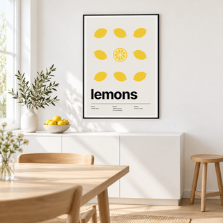Grid of yellow lemons with green leaves above a sideboard in a kitchen