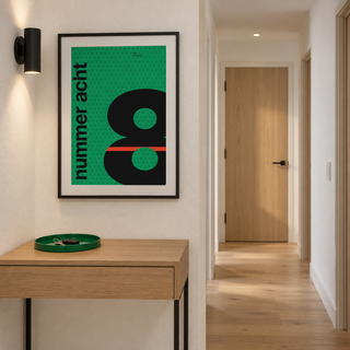 Number eight typography print above a console table in a hallway