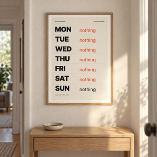 Monday to Sunday nothing print on the wall of a bright hallway