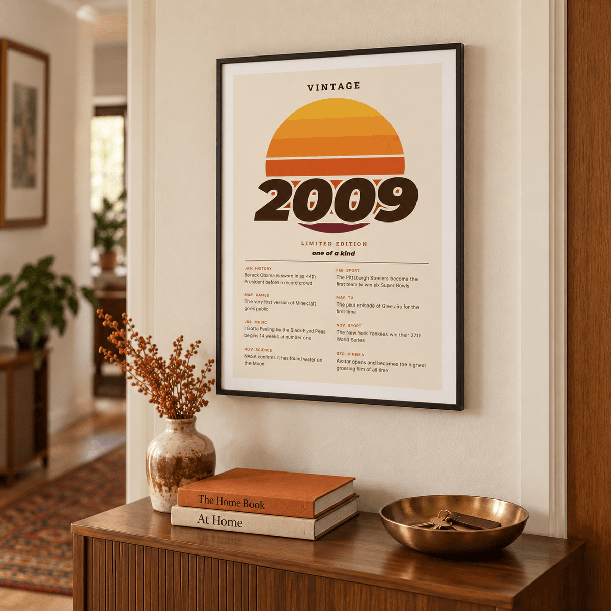 Retro sunset print with 2009 in italic lettering in a calm room setting