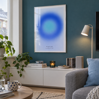 Blue halo gradient print with small caps in a living room against a petrol wall
