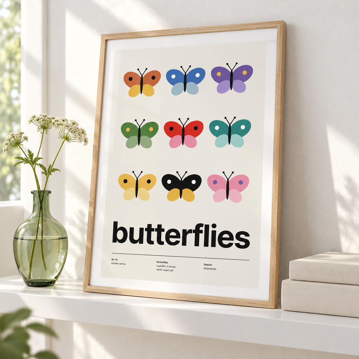 Nine colourful butterflies in a grid leaning on a picture ledge with books