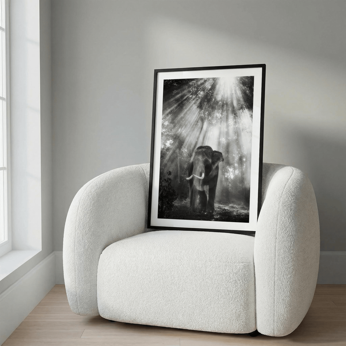 Diagonal rays illuminate tusked elephant and misty woodland print