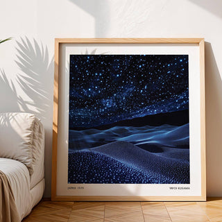 Navy blue wall art with surreal rolling dunes and night sky