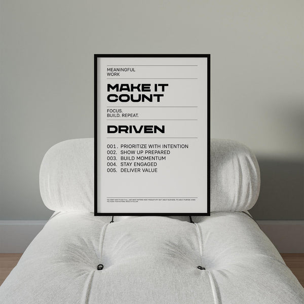 Bold wall art piece with productivity quotes for modern office decor.