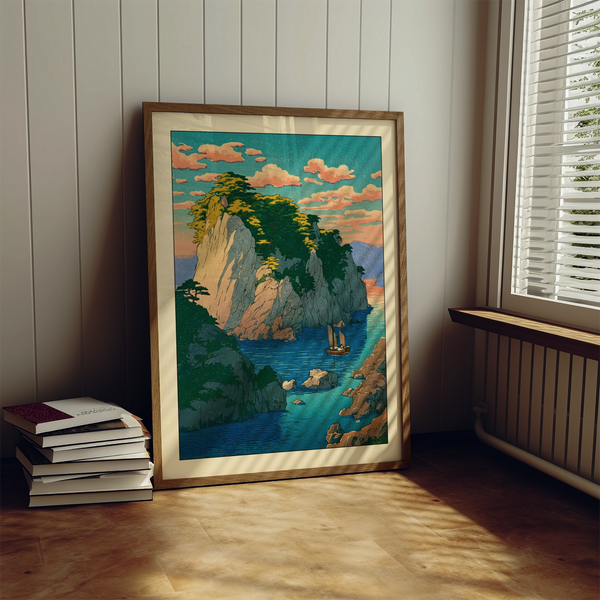 Angled mockup of coastal landscape poster featuring tall cliffs and a small boat