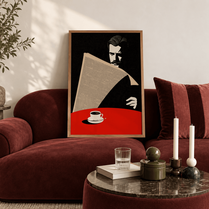 Art Deco Newspaper Reader Print leaning on a burgundy sofa with plant shadow on the wall