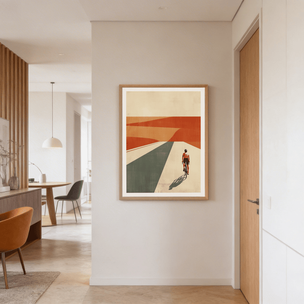 Geometric perspective artwork of bike rider heading into desert hills