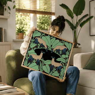 Square wildlife wall art print with four deer figures and repeating leafy forms