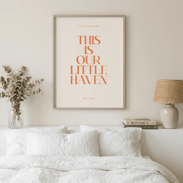 Minimal text print with “Leave the day outside” and “Safe + Loved” lines and stacked serif lettering