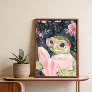 Painterly Turtle Reading Art Print featuring a turtle character reading a book in a botanical setting