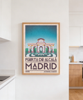 Framed-style view of Madrid city landmark print poster showing Puerta de Alcalá and decorative paving motifs