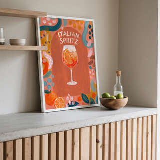 Hand-lettered drinks wall art poster reading Italian Spritz above a spritz glass with citrus slice