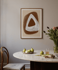 Neutral geometric wall decor with hollow triangle and rich paint strokes