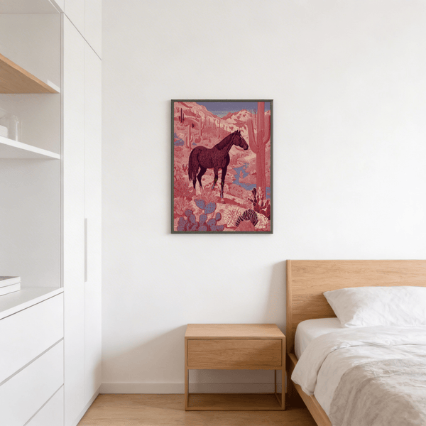 Lone horse standing amid prickly pear and tall cacti in pastel desert hues