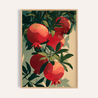 Framed Pomegranate Art Print with red fruits and green leaves on a cream background