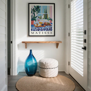 French prints with a view of cypress trees, terracotta rooftops, and fresh ingredients.