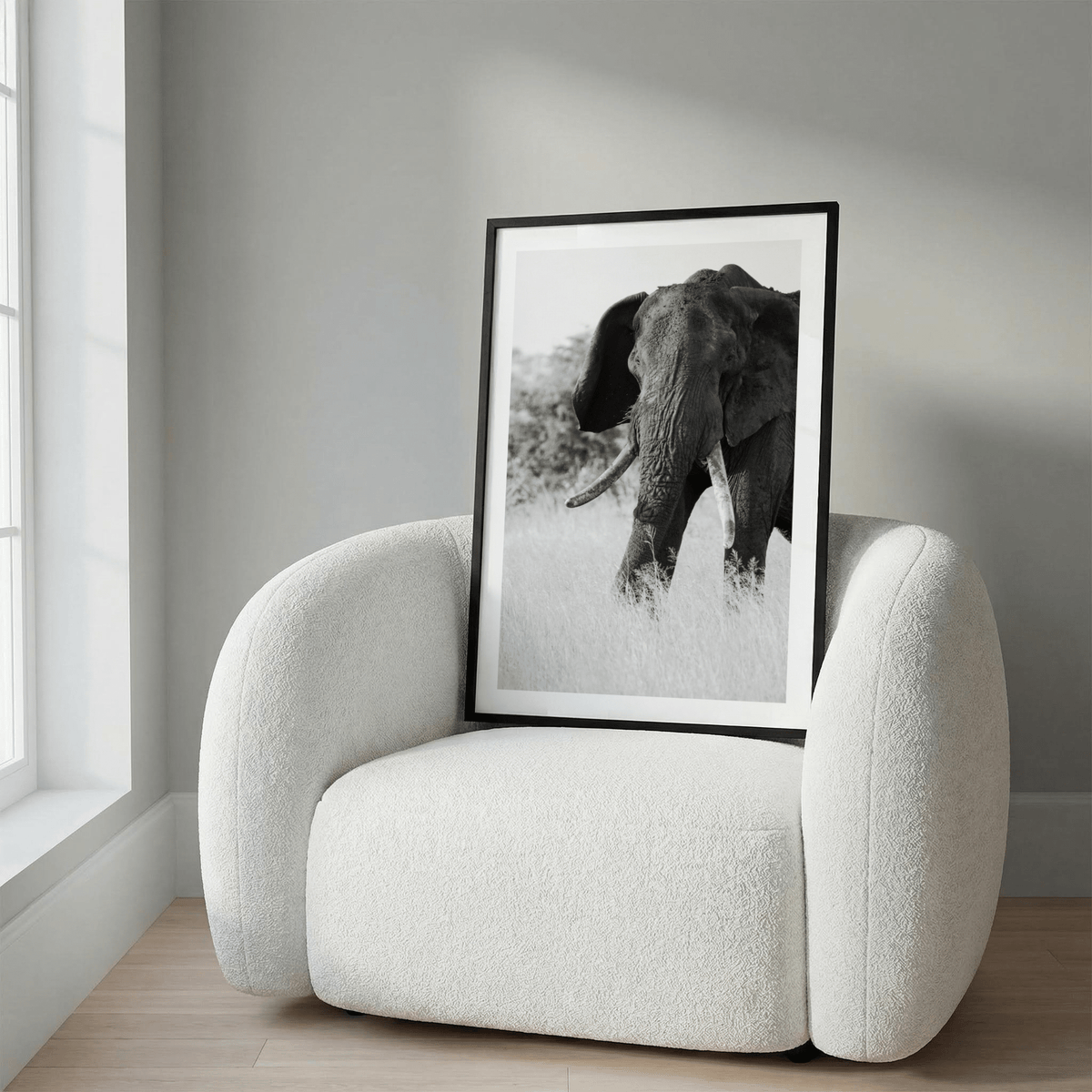Framed mockup of Elephant Black and White Art Print with centered elephant portrait