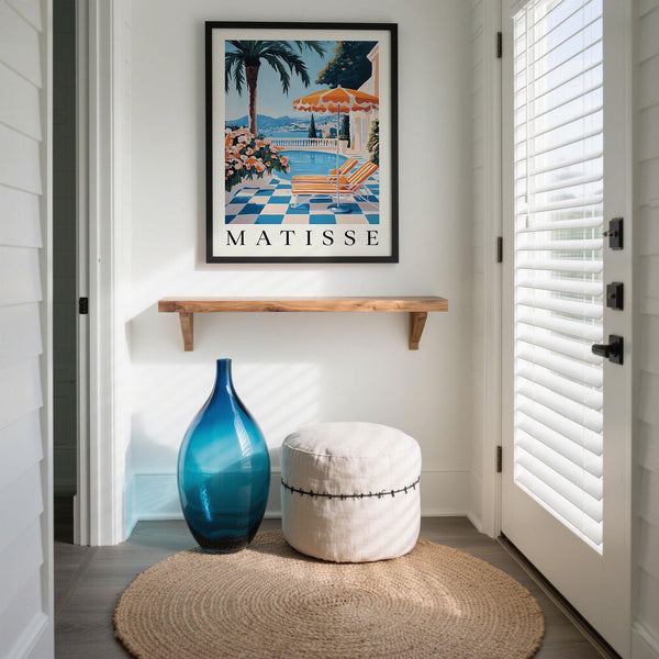 Coastal-inspired Amalfi Coast wall art featuring a scenic seaside terrace and vivid blue tiles.