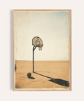 Basketball Hoop Art Print showing solitary hoop and ball on open dusty court