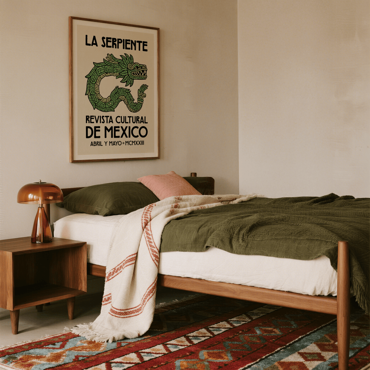 Displayed vintage-style serpent print poster reading LA SERPIENTE and REVISTA CULTURAL DE MEXICO