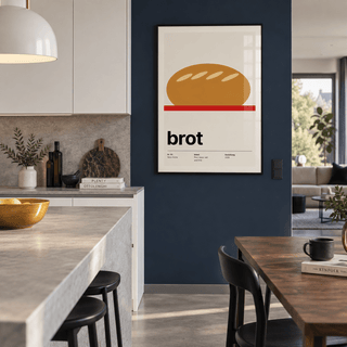 Golden loaf typography print in an open kitchen against a navy wall