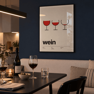 Minimal wine glass typography print above a banquette in a dining against a midnight wall