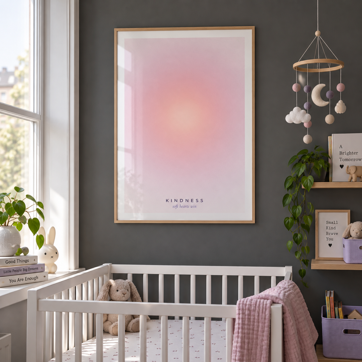 Warm pink gradient print in a nursery against a charcoal wall
