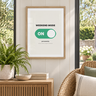 Funny weekend retirement print in a garden room filled with green plants