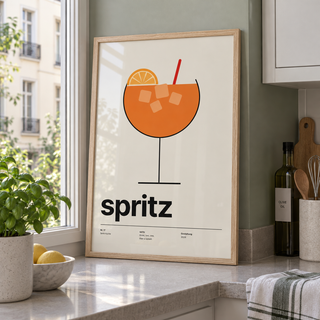 Swiss style spritz typography print in a kitchen window against a sage wall