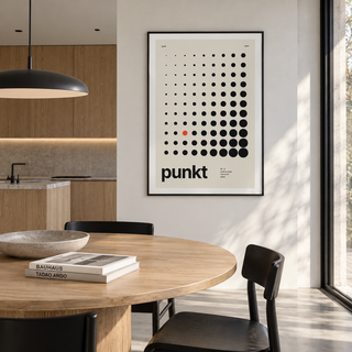 Swiss style dot print with one red dot on the wall of a kitchen diner
