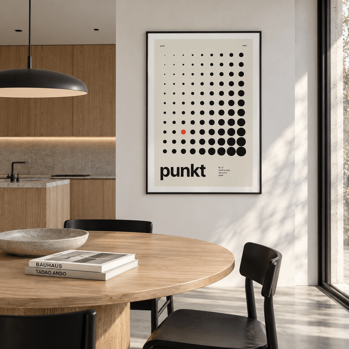 Swiss style dot print with one red dot on the wall of a kitchen diner