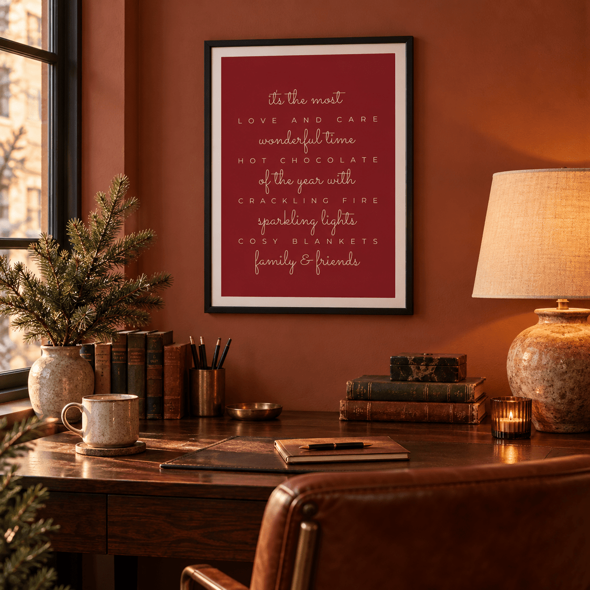 Red and cream Christmas quote print in a home study at Christmas