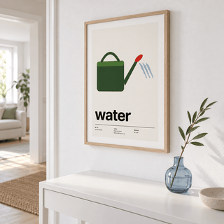 Swiss style watering can print above a console table in a hallway