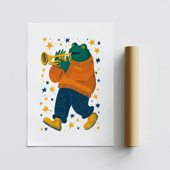 Frog Playing Trumpet Art print with a frog in an orange jumper playing trumpet next to a packaging tube