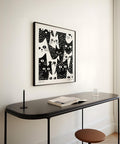 Contemporary cat print with quirky design elements.