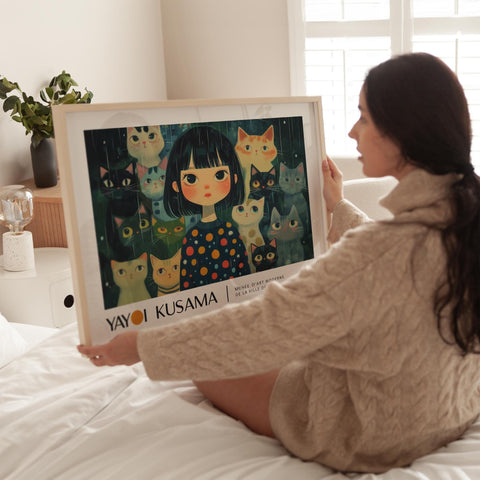 Black-haired girl with cats in a horizontal poster design.