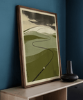Textured landscape wall art with curved fairway line and distant figure