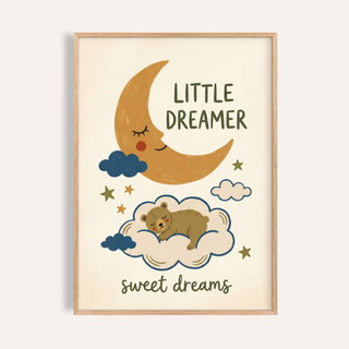 Above the crib, Little Dreamer Wall Art poster with crescent moon, clouds, stars, and sleeping bear