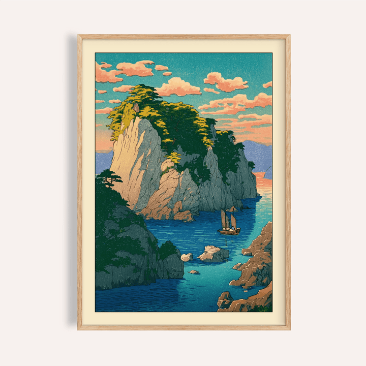 Framed view of Hasui Kawase coastal print poster showing cliffs, inlet, and sailboat