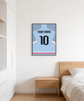 Featuring a light blue football shirt poster with bold black number 10 and name text