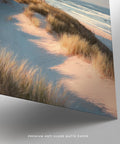 Lighthouse wall art with a warm-toned beach scene under soft pastel skies.